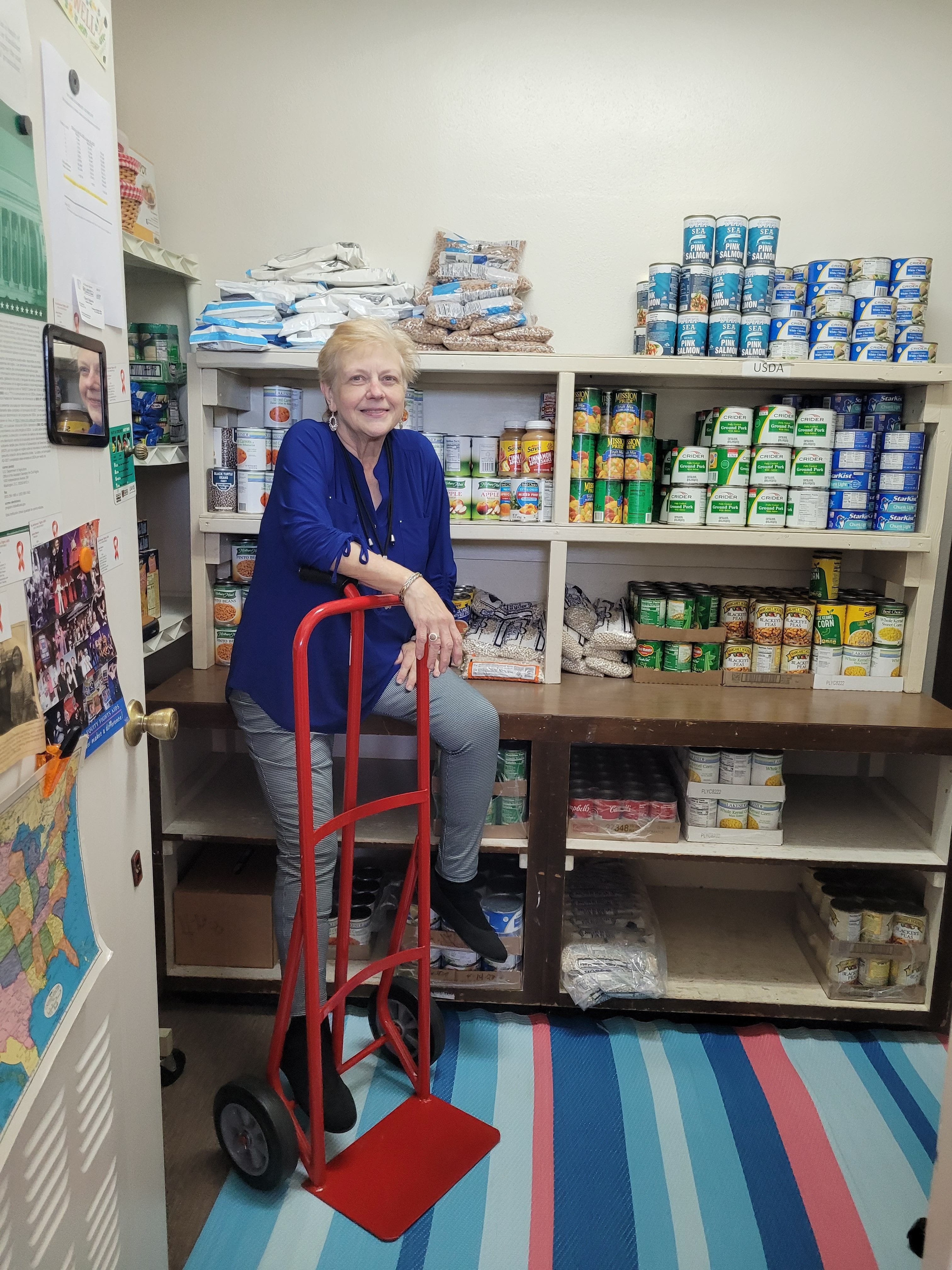 Director of SAFA since 2001. Putting in a hard days work restocking the pantry.